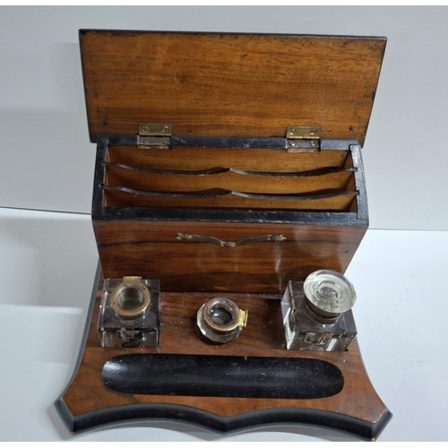 198 - Stylish antique wooden desk tidy complete with ink wells and letter rack