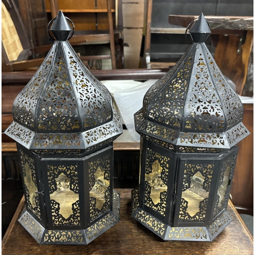 210 - Pair of north African style metal lanterns