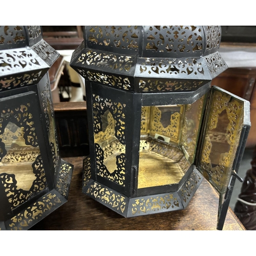 210 - Pair of north African style metal lanterns