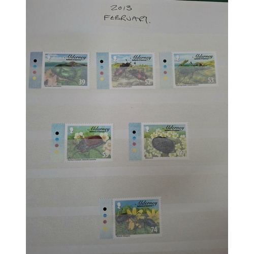 229 - Three stunning albums containing Guernsey & Alderney all mint unmounted sets and/or mini-sheets, pos... 