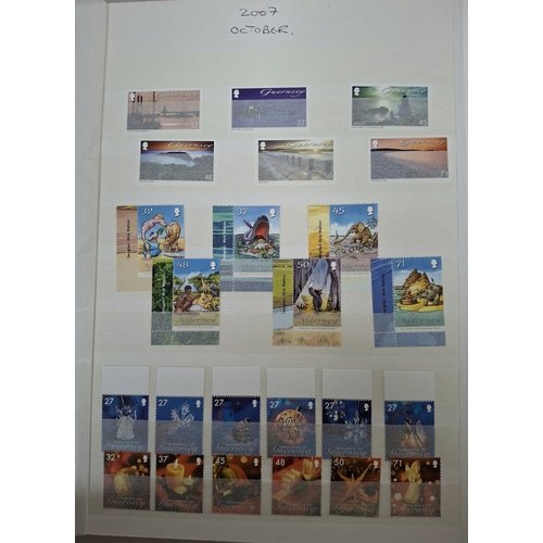 229 - Three stunning albums containing Guernsey & Alderney all mint unmounted sets and/or mini-sheets, pos... 