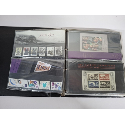 234 - Two albums filled with Queen Elizabeth II GB presentation packs December 2000 to December 2008, poss... 