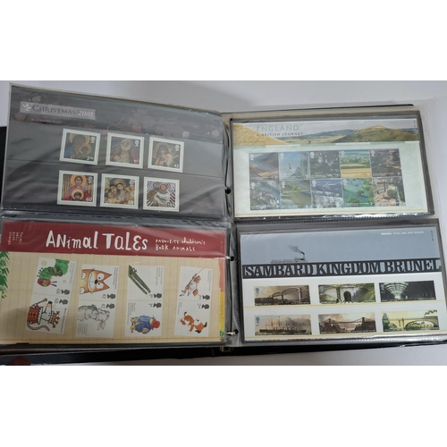 234 - Two albums filled with Queen Elizabeth II GB presentation packs December 2000 to December 2008, poss... 