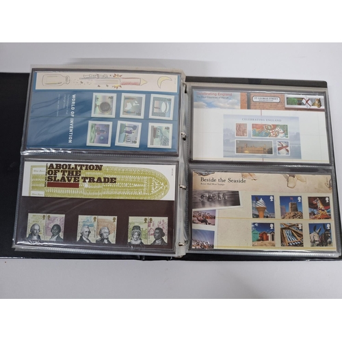 234 - Two albums filled with Queen Elizabeth II GB presentation packs December 2000 to December 2008, poss... 