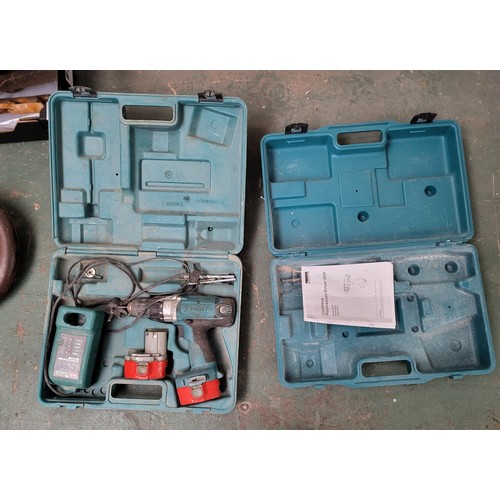 243 - Makita drill with battery and one other box (2)