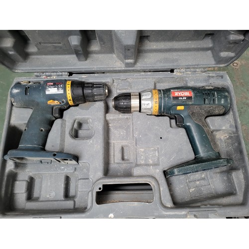 254 - Collection of Ryobi power tools including an angle grinder, two drills and a saw (4)