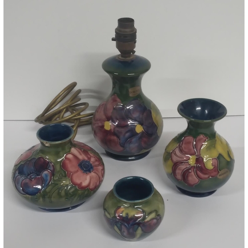 313 - Three old Moorcroft Hibiscus pattern small vases together with a matching Moorcroft table lamp, all ... 