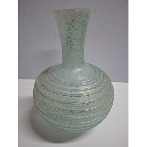 316 - Superb, old ribbed glass bottle believed to be Asian in origin,

Approx 21cm tall