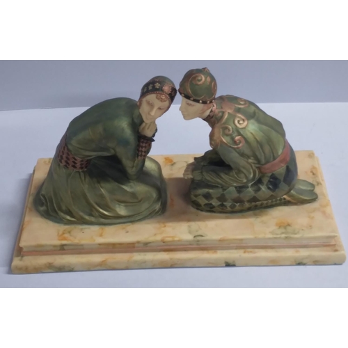 320 - Fine quality ornament depicting to flappers on a plinth