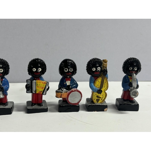 327 - 8 ceramic Golly band figures