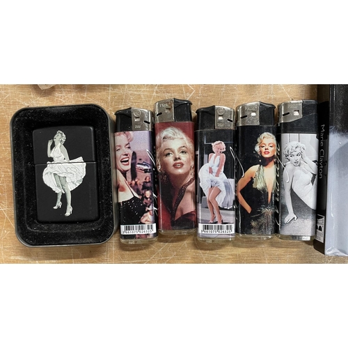 343 - Quantity of Marilyn Munroe collectables including a rare boxed Zippo lighter etc (Qty)