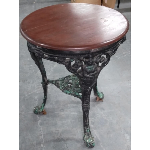 402 - Ornate, cast iron bar table with wooden top