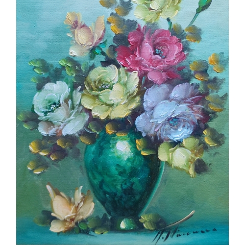 90 - An indistinctly signed still-life flowers on canvas, 34 x 26cm