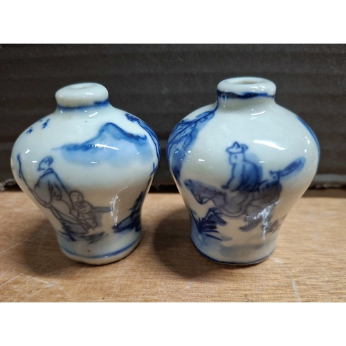 364 - Two tiny Oriental blue & white decorated snuff pots, both signed to base (2)