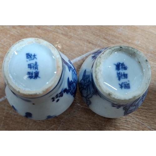 364 - Two tiny Oriental blue & white decorated snuff pots, both signed to base (2)