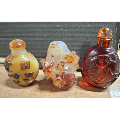 366 - Three decorated Oriental glass snuff bottles (3)