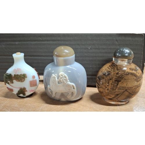 368 - Three decorated fine coloured Oriental snuff bottles (3)