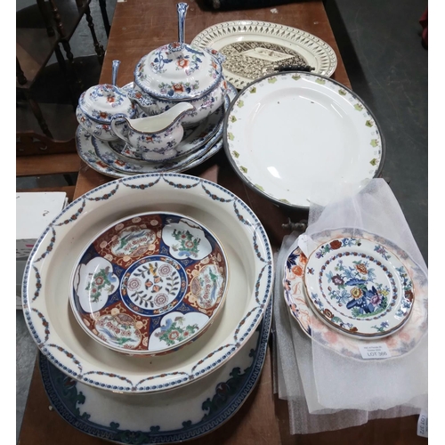 299 - Large collection of meat platters together with serving bowls and plates.