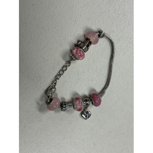 13 - Pandora style bracelet with charms