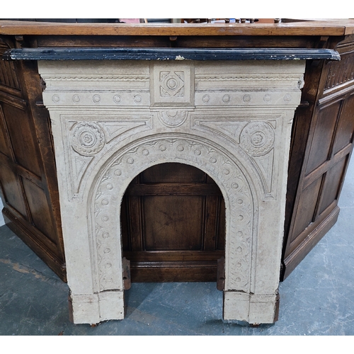 386A - An early, ornate cast iron fire surround