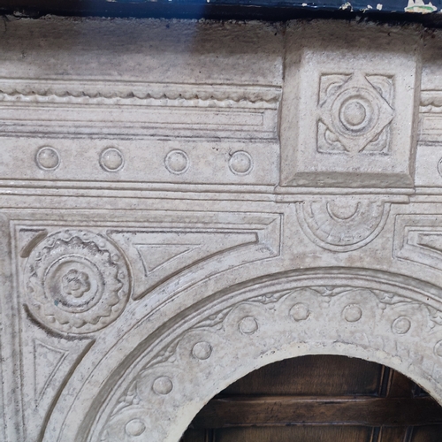 386A - An early, ornate cast iron fire surround