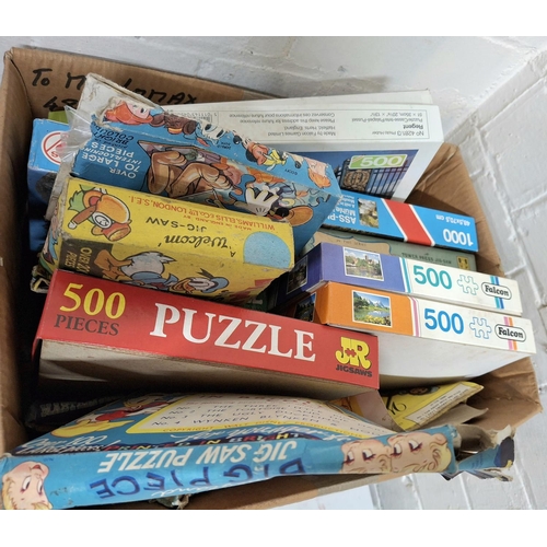 64 - Box full of modern and older jigsaws (Qty)