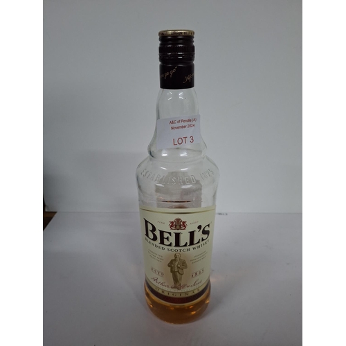 3 - Half bottle of 1 litre Bells whisky approx 1/2 litre