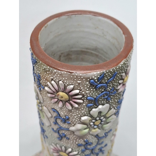 119 - Unique tall Japanese 18thC/19thC bottle necked vase with extensive polychrome applied floral decorat... 