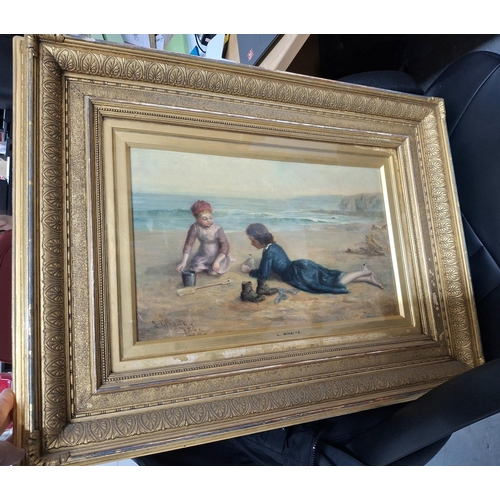 71 - L Whaite 1886 oil on canvas of two girls playing on a sandy beach in original gesso frame,

The oil ... 