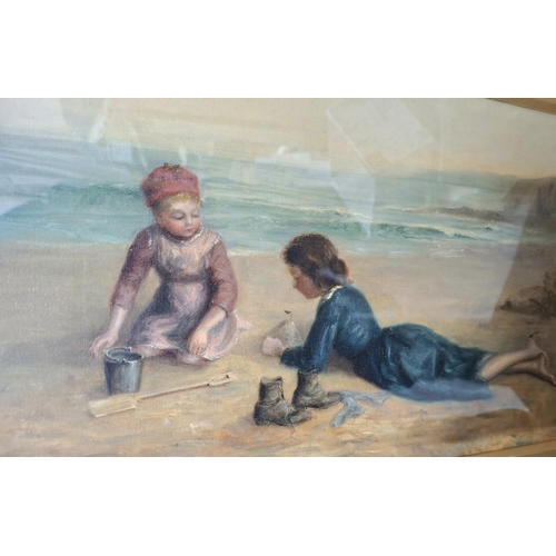 71 - L Whaite 1886 oil on canvas of two girls playing on a sandy beach in original gesso frame,

The oil ... 