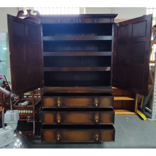 76 - A stunning antique linen press cupboard with two doors revealing three inner slide-out linen drawers... 