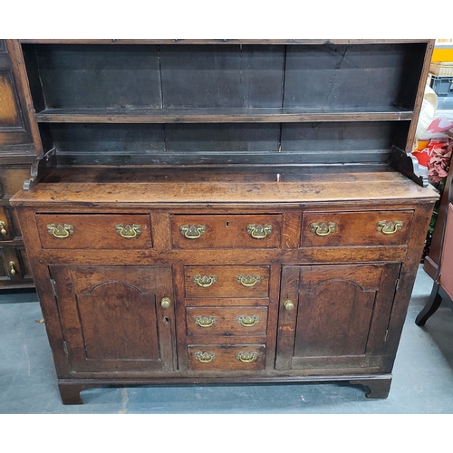 77 - Antique Oak dresser, possibly mid 1800's, with removable top section comprising of two doors and fou... 