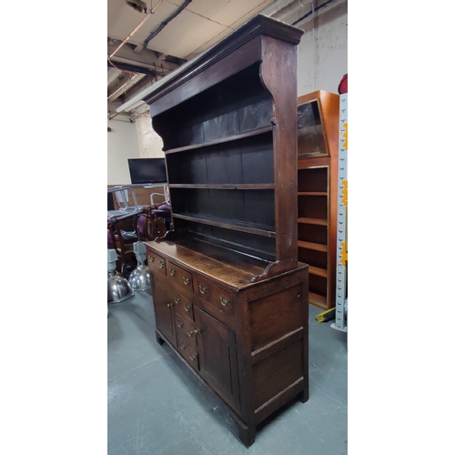 77 - Antique Oak dresser, possibly mid 1800's, with removable top section comprising of two doors and fou... 