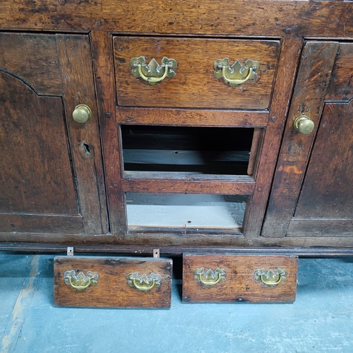 77 - Antique Oak dresser, possibly mid 1800's, with removable top section comprising of two doors and fou... 