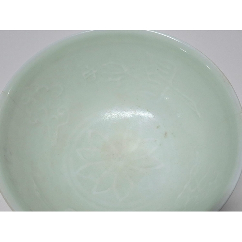 53 - Sung (Song) dynasty (960-1279) rice bowl with faint flower outline decoration in the base of the bow... 