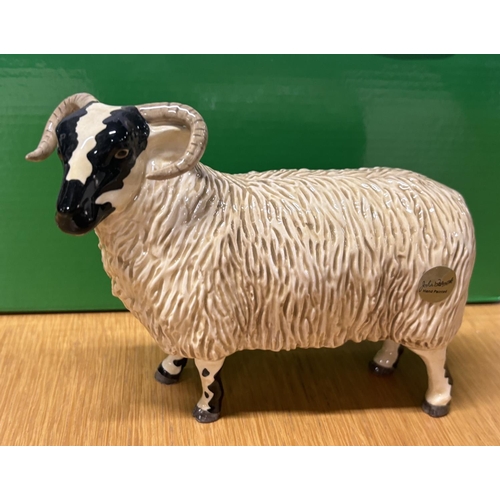 18 - Large, still boxed John Beswick Ram, hand painted,

17cm long X 13cm tall