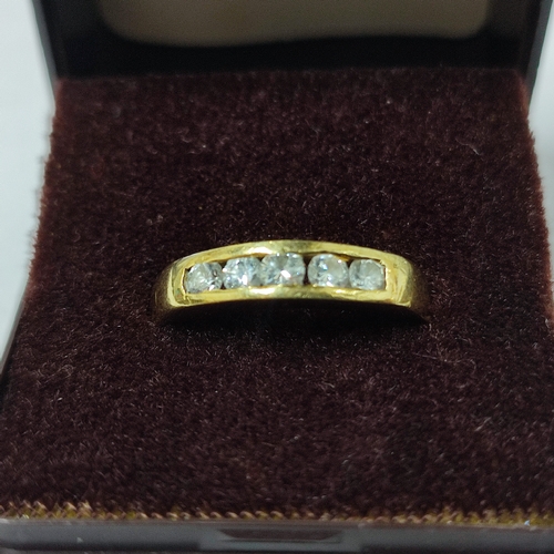 90 - An 18ct. Yellow Gold and Diamond half-hoop ring with five round brilliant cut Diamonds approx. 1/2ct... 