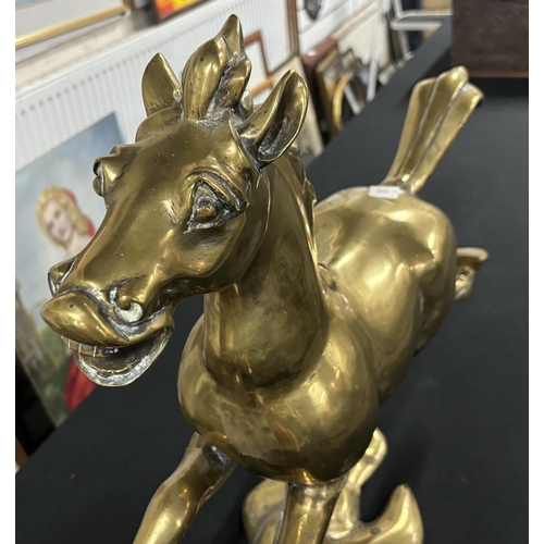 10 - Large brass galloping horse,

70cm long X 52cm tall