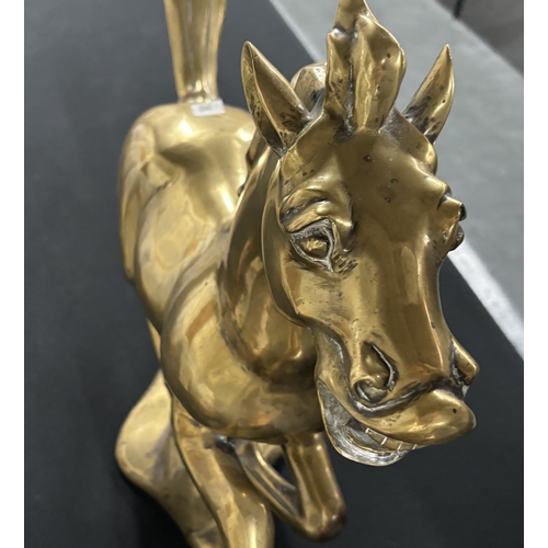 10 - Large brass galloping horse,

70cm long X 52cm tall