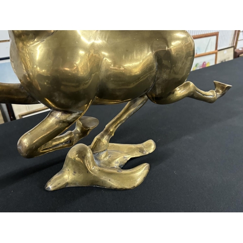 10 - Large brass galloping horse,

70cm long X 52cm tall