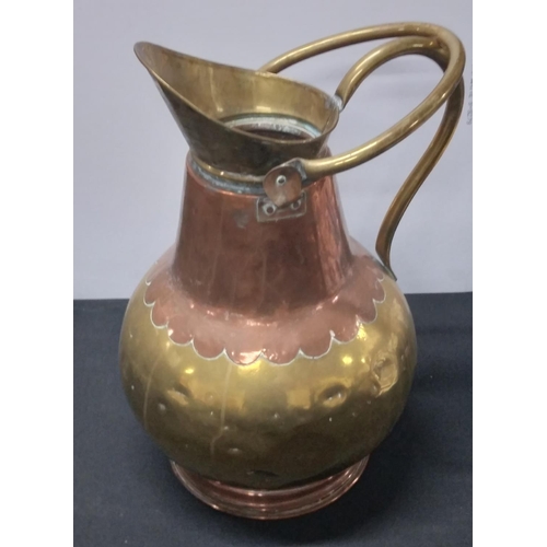 218 - Large continental copper and brass water jug,

49cm tall