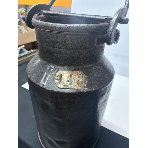 193 - Antique cast metal milk churn