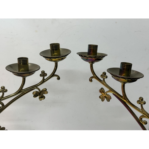 194 - Pair of large 5-arm brass church candle holders