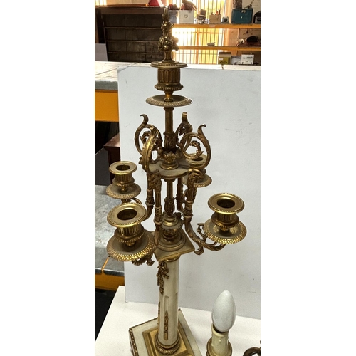 195 - Pair of mid 20thC, tall ornate brass candle holders in the French classical style, other with a matc... 