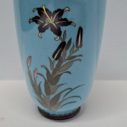 206 - A Japanese Meiji period cloisonné vase with white metal wire decoration of flowers,

14cm tall