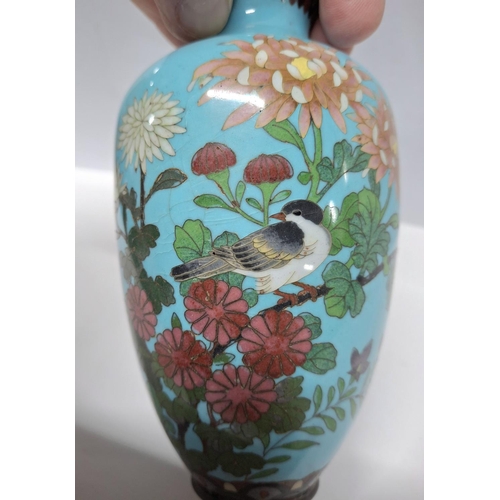 207 - A Japanese Meiji period cloisonné vase blue ground with a bird on a flowering branch,

14.5cm tall