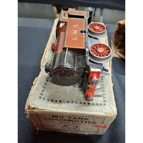 209 - Large quantity of mid 20thC Hornby 0 gauge items including a complete track, M3 tank locomotive with... 