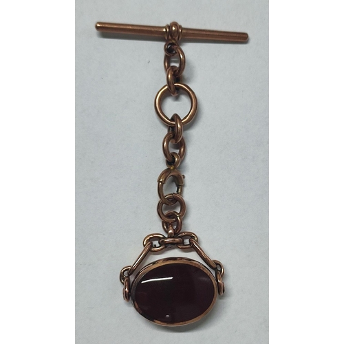 159 - A hallmarked chunky 9ct. Rose Gold fob with Carnelion, short Albert chain and T-bar, 16.7 grams gros... 