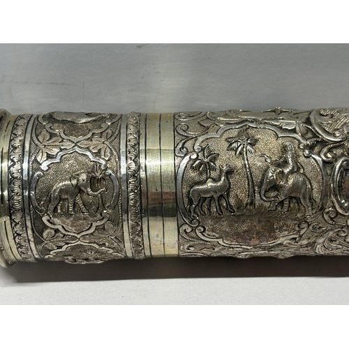 228 - Large Indian hammered silver scroll,

535 grams       approx 40cm long