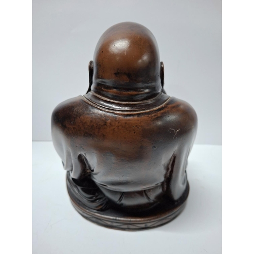 29 - Finely carved Asian hardwood of Buddha,

The carving is 17cm tall